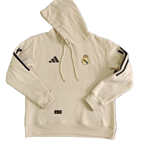 Cream Real Madrid hoodie with hood, kangaroo pocket, Adidas logo, and Real Madrid crest on chest.