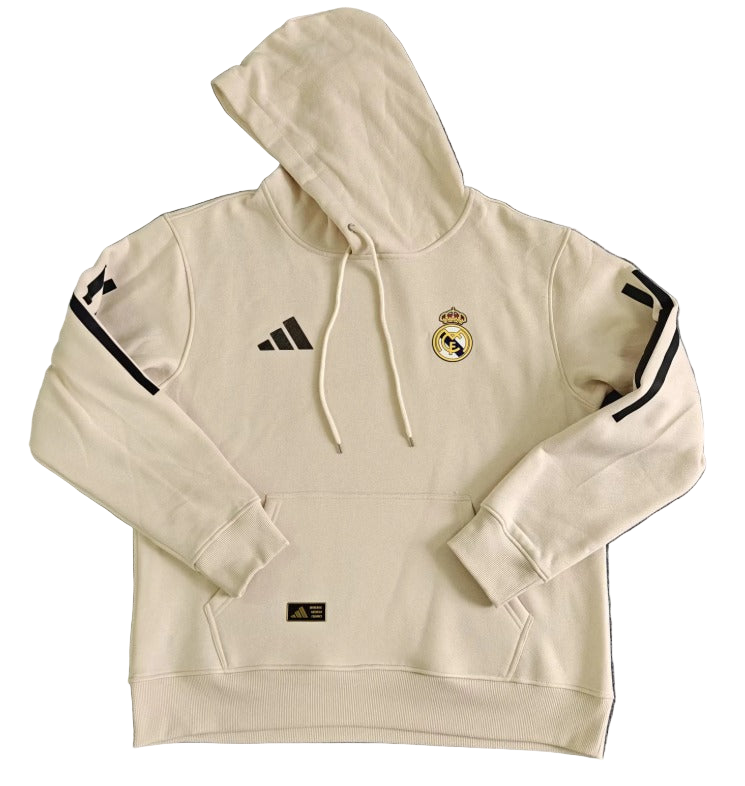 68a1ac5d-332a-4d94-a523-429021c9ffe3 Cream Real Madrid hoodie with hood, kangaroo pocket, Adidas logo, and Real Madrid crest on chest.