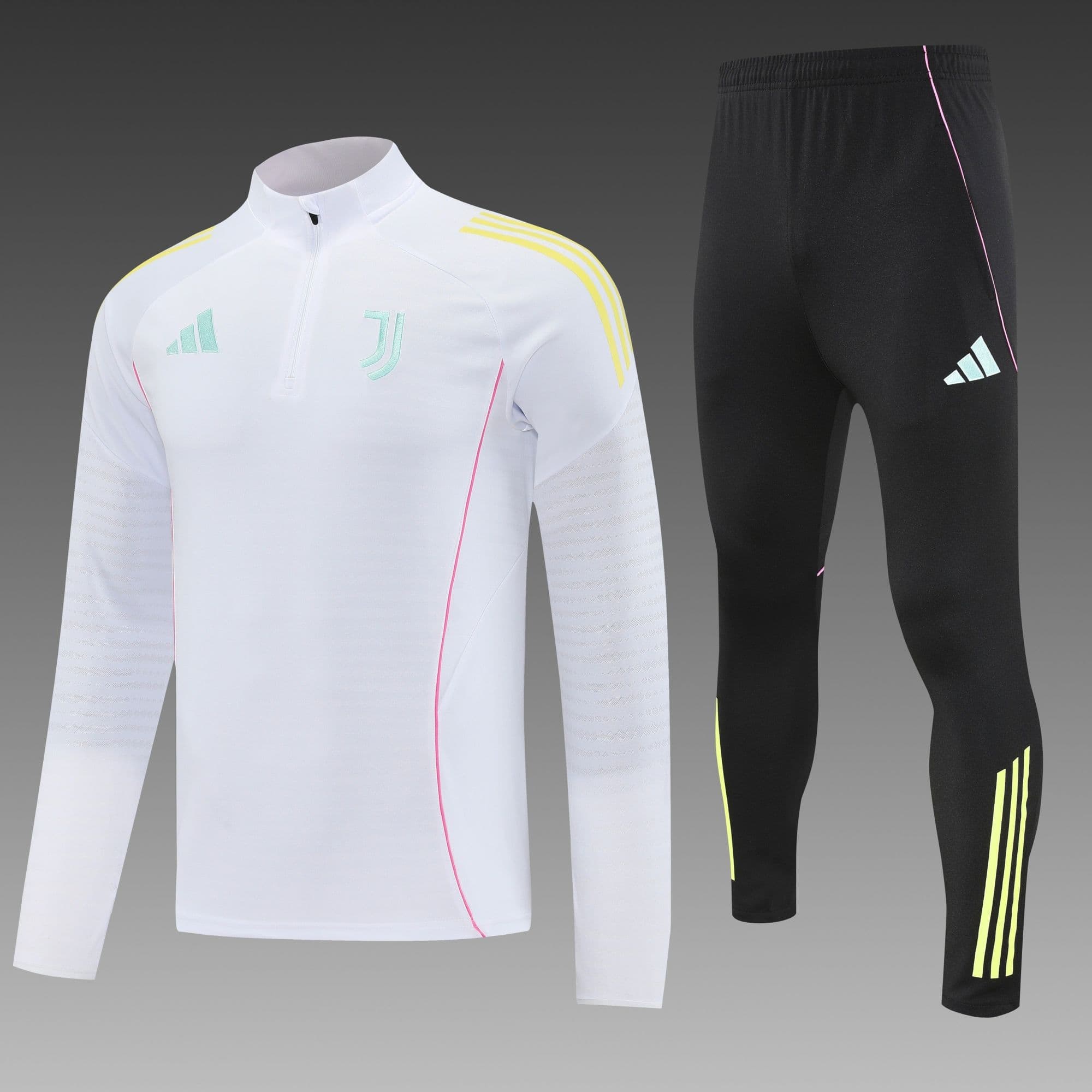 68f1762e | UAE SPORT STORE White Juventus training top with mint logo and yellow shoulder stripes, paired with black leggings featuring pink and neon-yellow side accents.