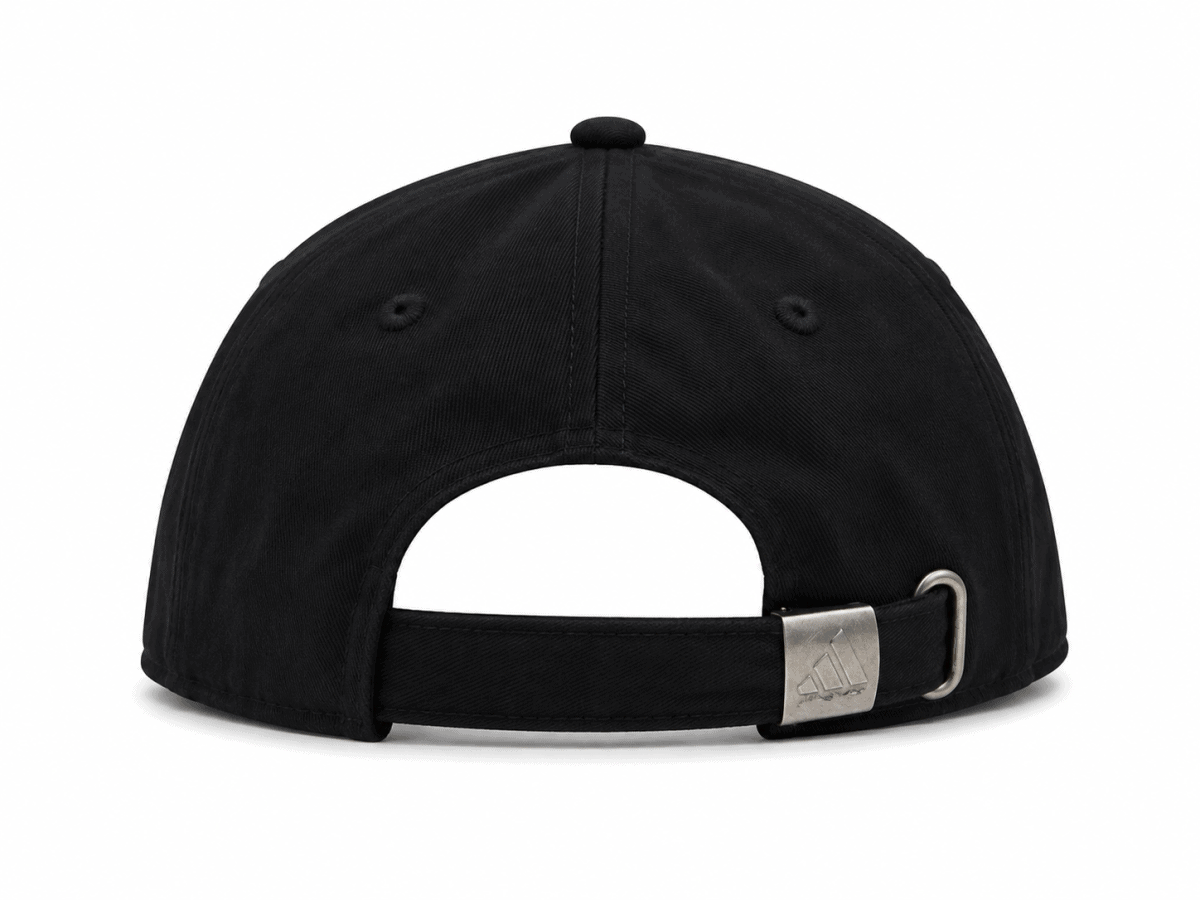 Back view of a black baseball cap with an adjustable strap and metal buckle featuring an Adidas logo on the buckle.