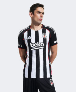 Male model wearing a Beşiktaş football jersey with black and white vertical stripes and the 'beko' sponsor on the front.