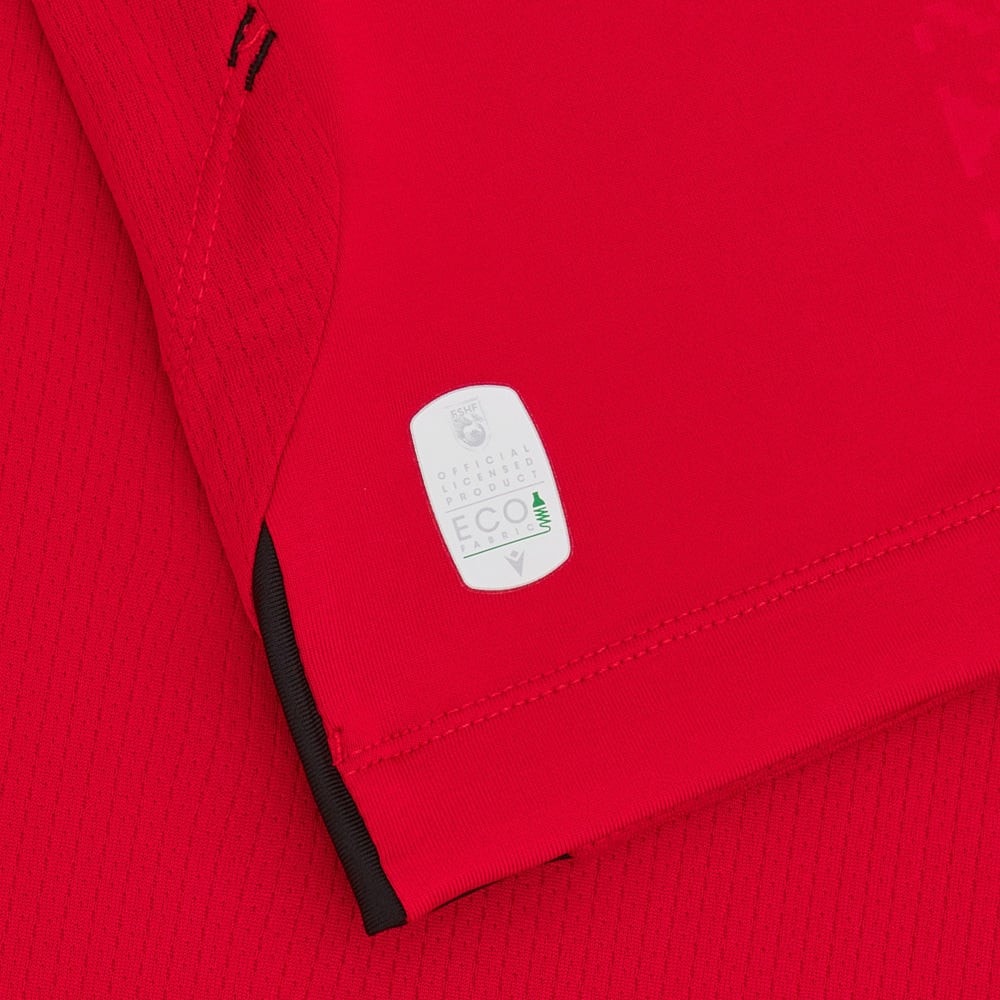 6MG17O4wPKXEoSP | UAE SPORT STORE Close-up of red fabric with an Eco-friendly label reading ECO on a white rounded rectangle