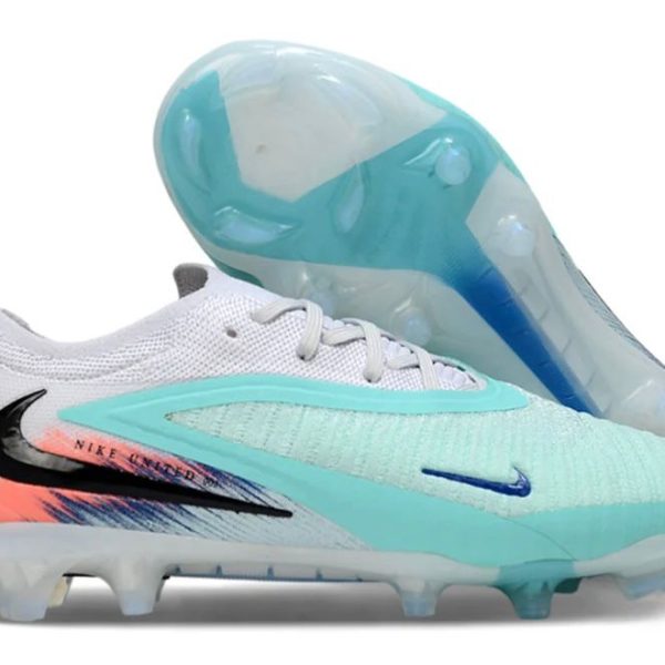Nike soccer cleats in white and mint with a blue swoosh and translucent outsole