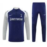 Tottenham Hotspur blue training top and pants with BetMGM sponsor, grey sleeves, squad kit vibe (training wear)