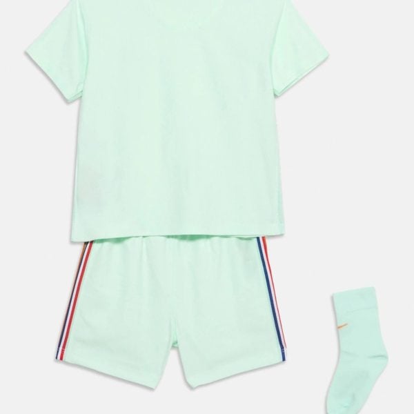 Mint green short-sleeve top and matching shorts with red and blue striped trim, laid out flat with a sock nearby (clothes set).