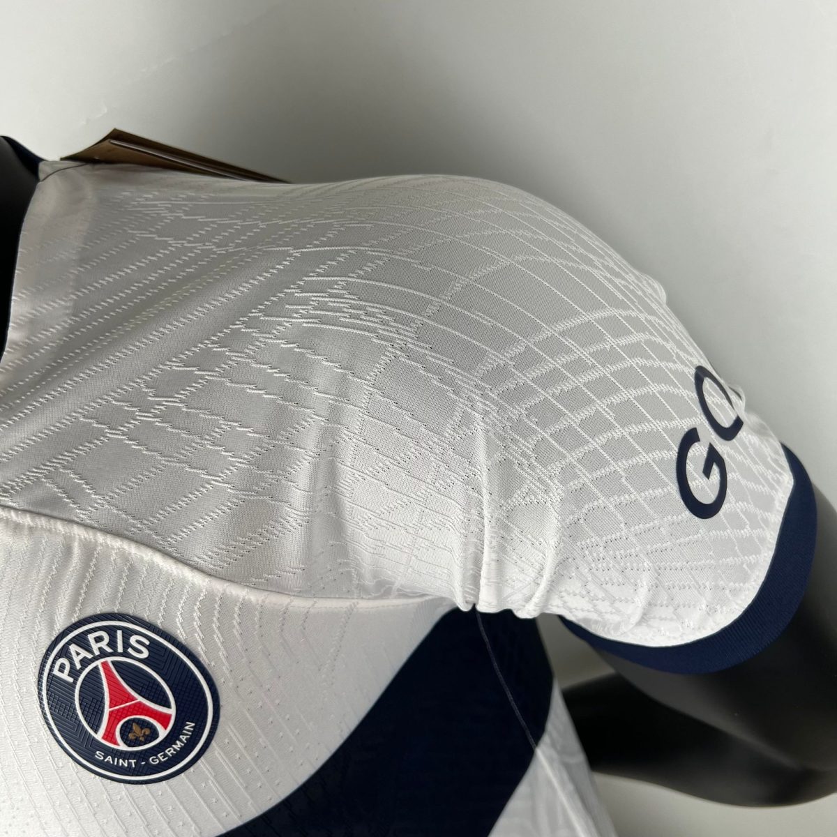 Light gray patterned baseball cap with the Paris Saint-Germain logo on the front center crest (PSG).