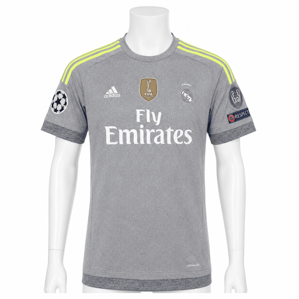Real Madrid away football jersey with gray color, yellow stripes, and sponsor logos.