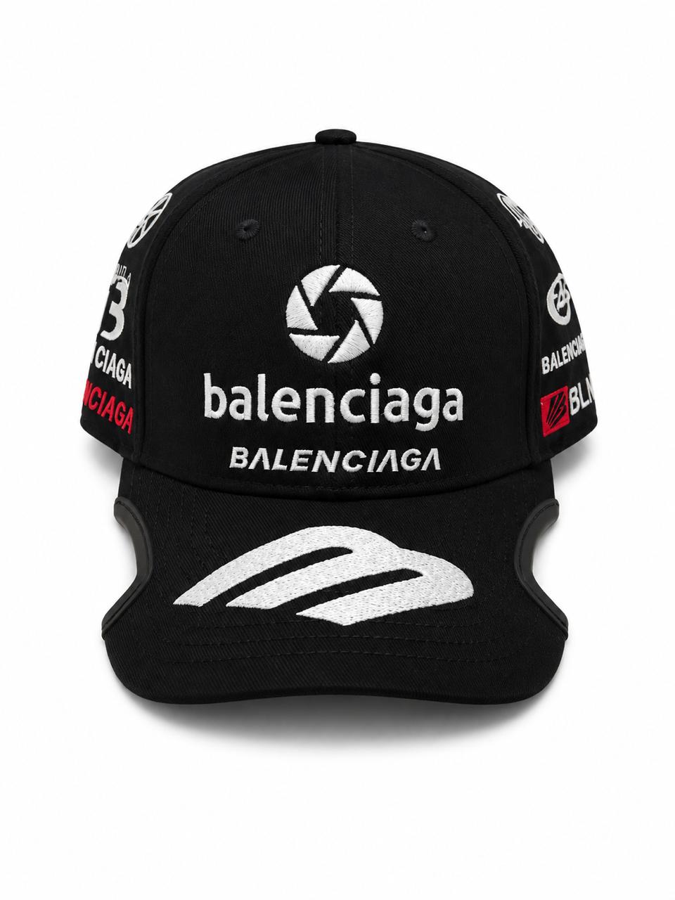 6f2b121c-2612-453b-9681-4421cbdbdbff Black Balenciaga cap with white embroidered logos on the front and sides and a curved brim.