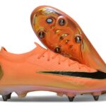 Bright orange soccer cleat with a black Nike swoosh and studded sole, shown from the side.