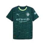 Dark green Manchester City jersey with geometric light-green triangles, neon collar, and Etihad Airways sponsor logo on the front.