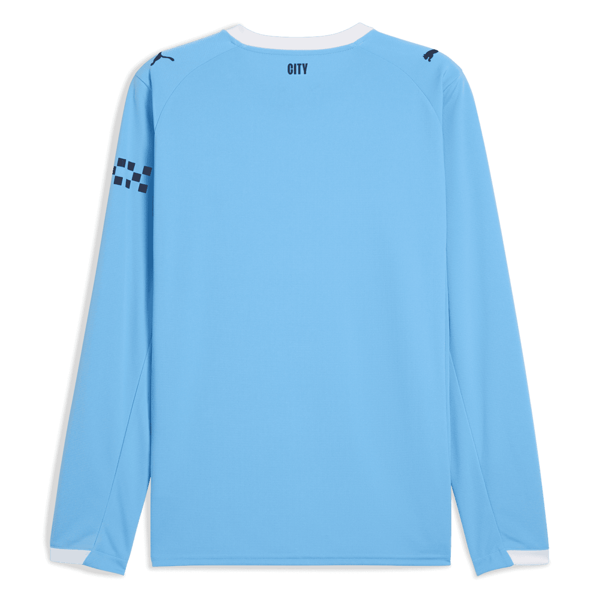 Back view of a light blue long-sleeve sports jersey with a white collar edge, 'CITY' text at the neck, and dark logos on the shoulders; left forearm features a dark checker pattern.