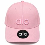 Pink casual baseball cap with "alo" logo.