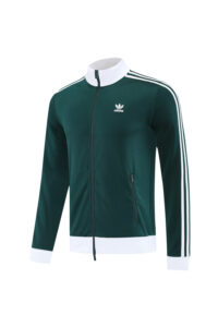 Dark green Adidas track jacket with white collar and cuffs, three white stripes along sleeves, front zipper, and zippered chest pocket logo on left chest.
