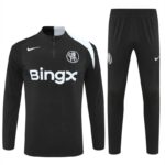 Black training tracksuit (long-sleeve top and pants) with sponsor 'BingX', Nike logos, and club crest on chest and thigh.