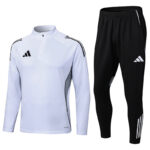 White long-sleeve athletic top with zip collar paired with black jogger pants; both feature Adidas branding and side panels.