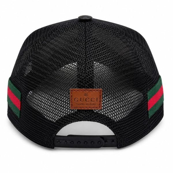 Back view of a black Gucci mesh cap with green and red striped sides, brown leather logo patch, and adjustable strap.