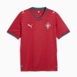 7515ef18-5bbe-40e7-8491-0021f211e03a | UAE SPORT STORE Red Portugal national team soccer jersey with turquoise trim and wavy pattern, features crest on the left chest and white Puma logos.