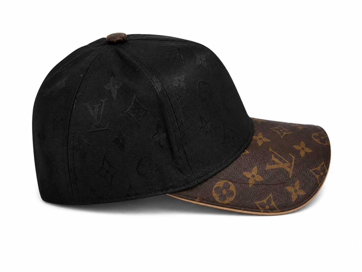 Louis Vuitton baseball cap: black crown with subtle monogram pattern and a brown LV-branded brim