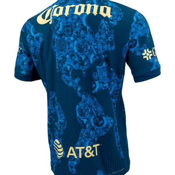 Blue athletic jersey shown from the back with a light-blue world-map pattern; AT&T sponsor logo near the lower back and repeating team crest graphics across the fabric.