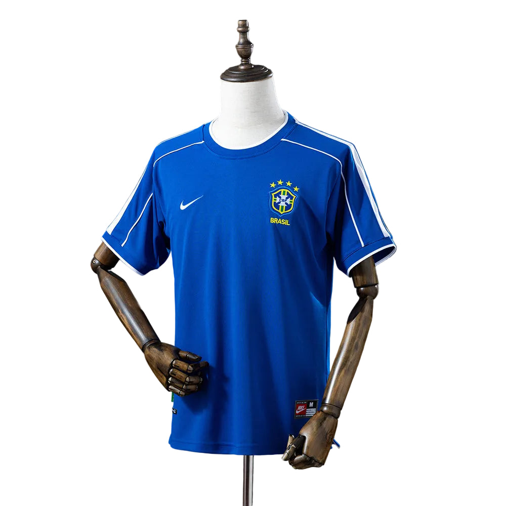 7d0687ec-1 | UAE SPORT STORE Blue Brazil national team soccer jersey on a mannequin, featuring the crest, stars, and Nike logo on the chest.