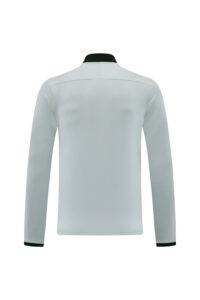 Back view of a light gray long-sleeve shirt with black collar and cuff trim.