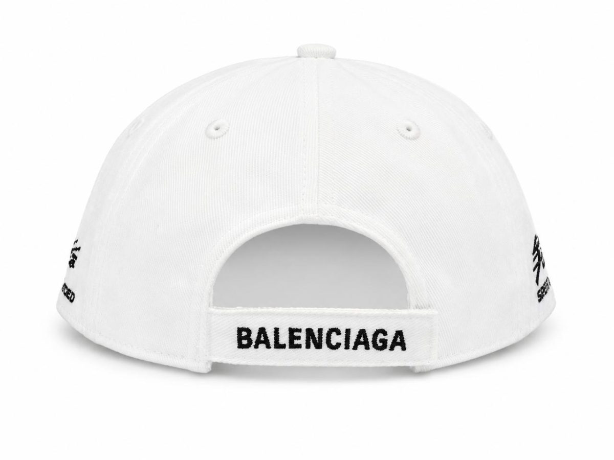 Back view of a white baseball cap with an adjustable strap embroidered with Balenciaga