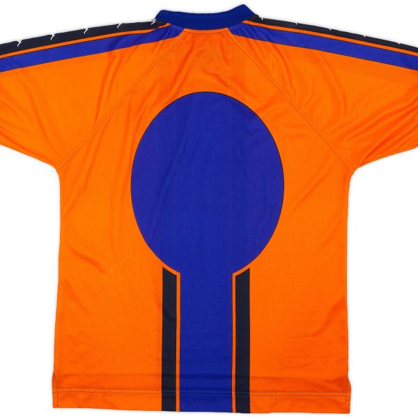 Back view of an orange sports jersey with large blue circular design and blue shoulder stripes.