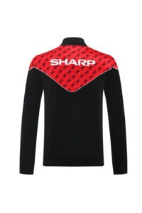 823b2f15 | UAE SPORT STORE Back view of black jacket with a red zigzag yoke across the shoulders and the white 'SHARP' logo.