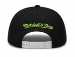 Bright neon green "Mitchell & Ness" logo on black snapback hat.