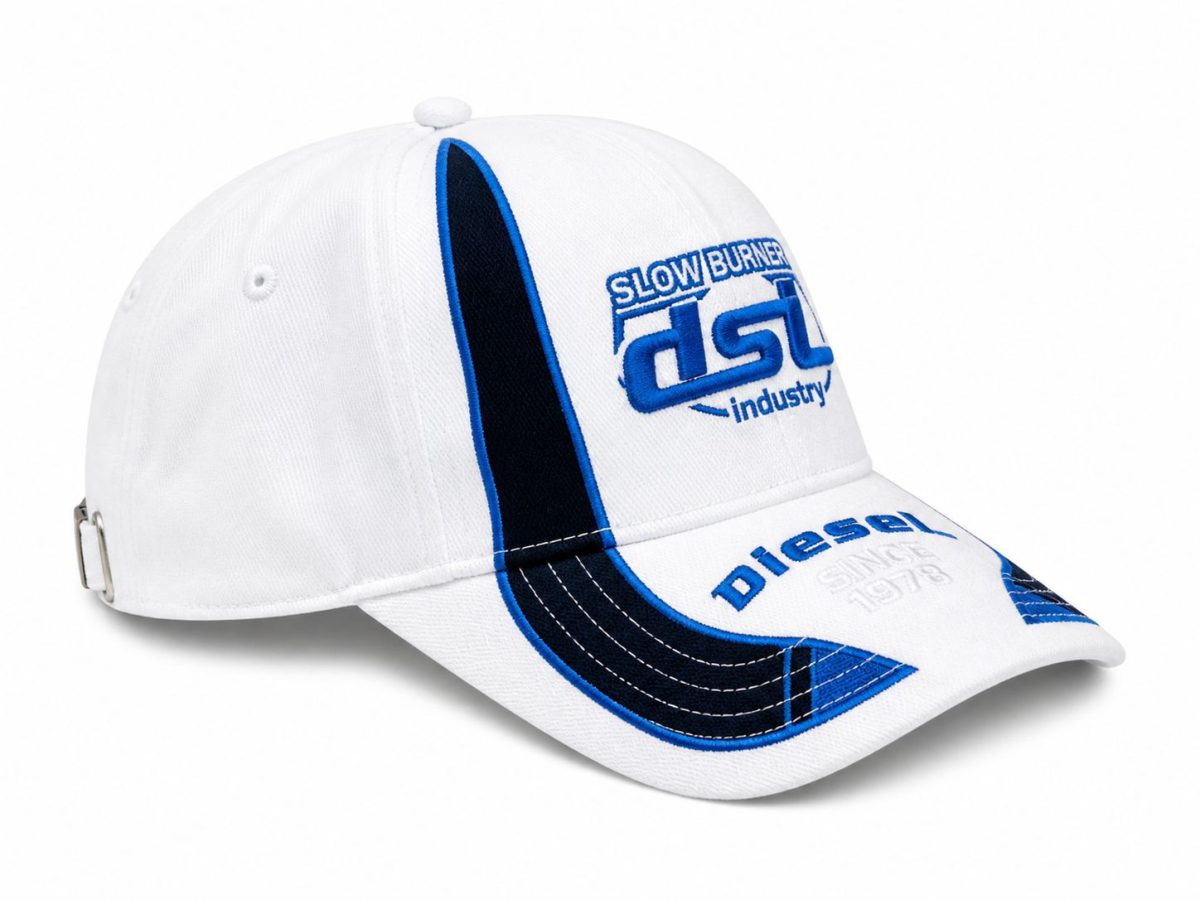 White baseball cap with a navy blue curved brim and blue trimming, featuring a blue embroidered logo on the front panel; adjustable strap visible at the back.