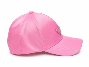 876e4240-9006-46c5-9682-e3841836ad41 | UAE SPORT STORE Pink baseball cap with a curved brim and a small metal emblem on the front, set against a white background.