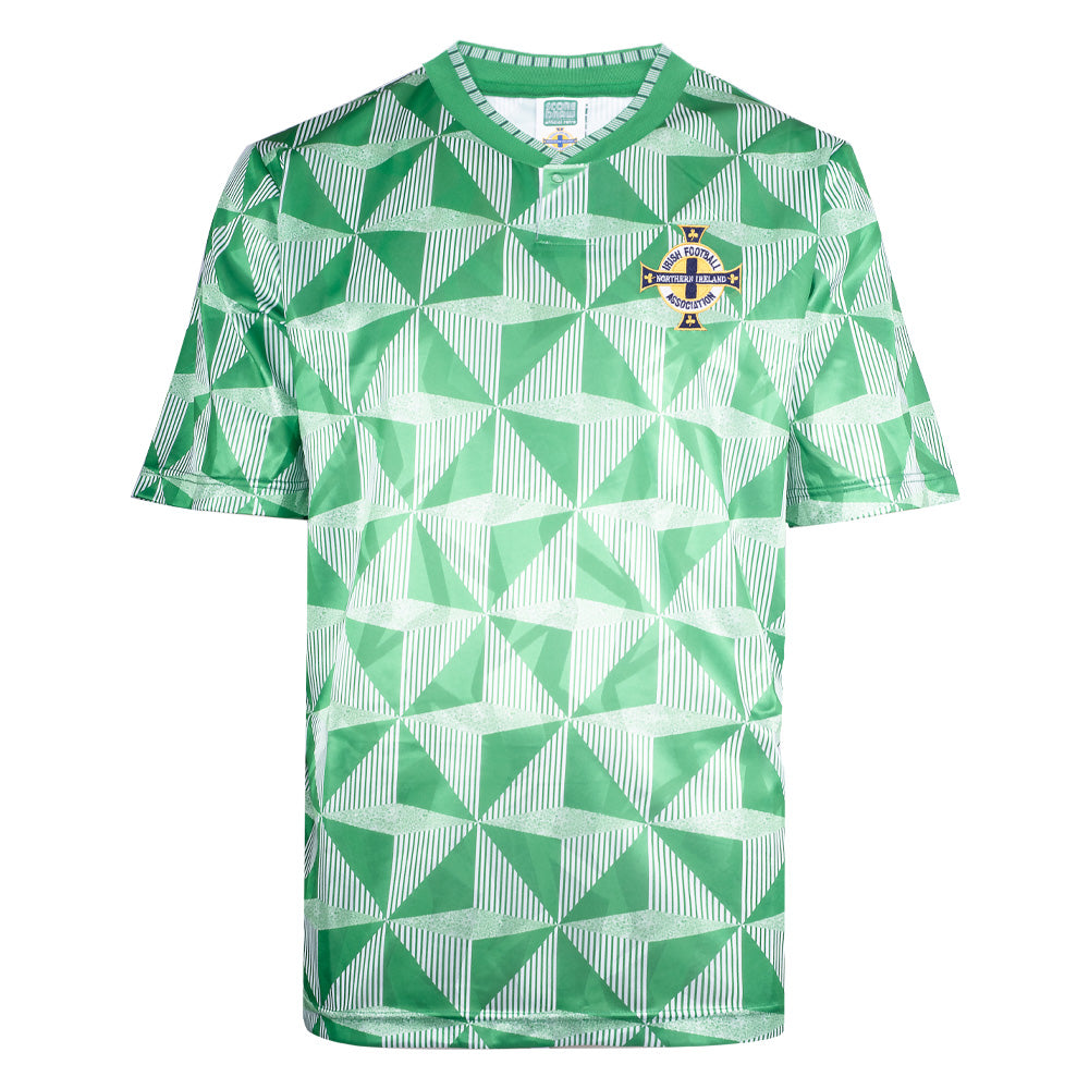 880-228_bfab2e32-4828-4d0a-bd5a-cc4f89f84a54 | UAE SPORT STORE Green football jersey with a geometric triangular pattern and a crest badge on the left chest; short sleeves and a round collar.