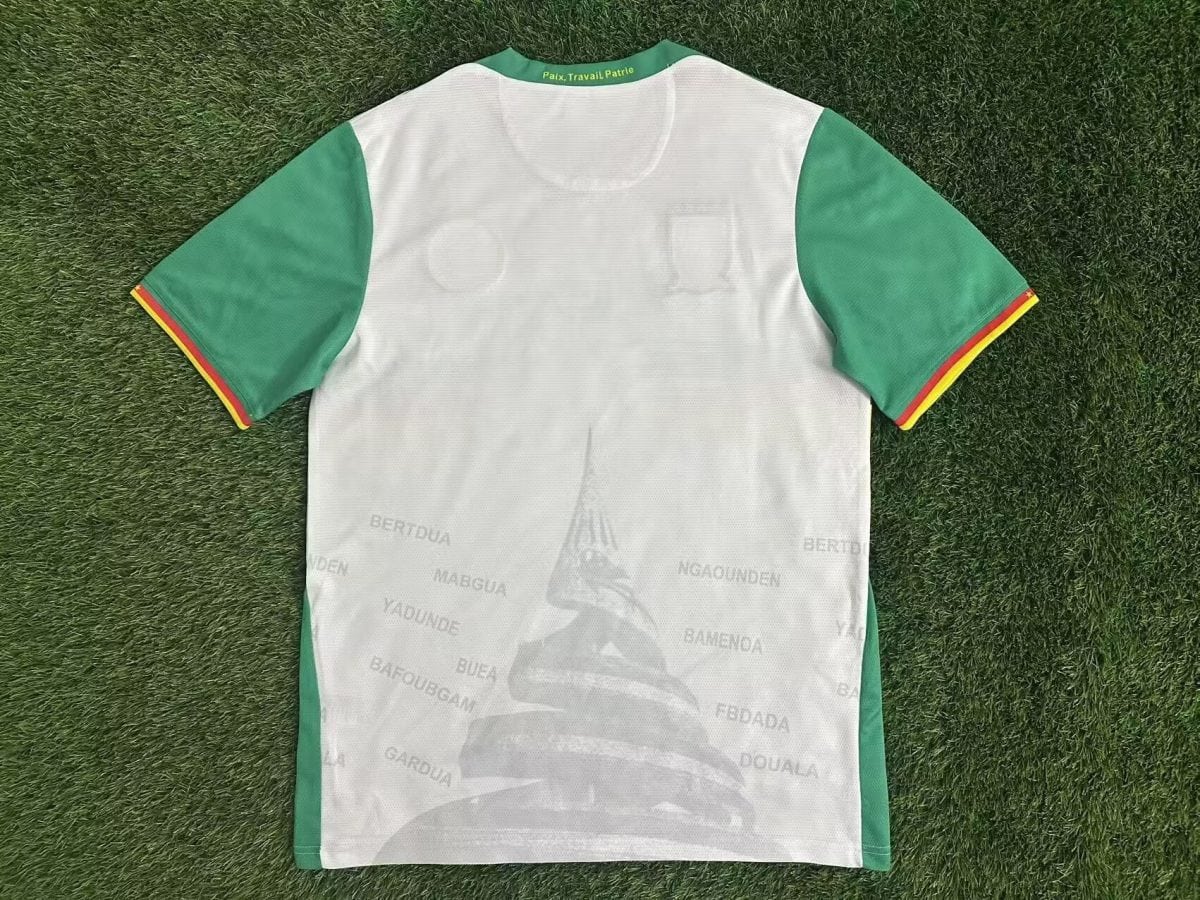 Light green-sleeved white polo or jersey with a green collar; collar reads 'Paix, Travail Patrie'.