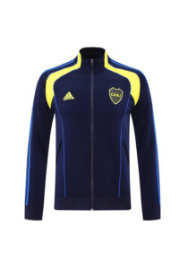 8d82ac38 | UAE SPORT STORE Navy blue Adidas track jacket with yellow shoulder panels and CABJ crest on the chest.