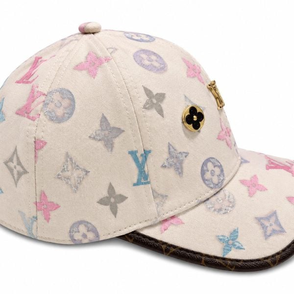 Pastel Louis Vuitton monogram baseball cap in beige canvas with pink, blue, and gray logos and a brown-trimmed brim.