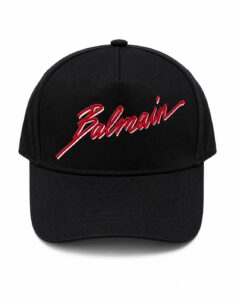 Black baseball cap with red Balmain script embroidery on the front panel