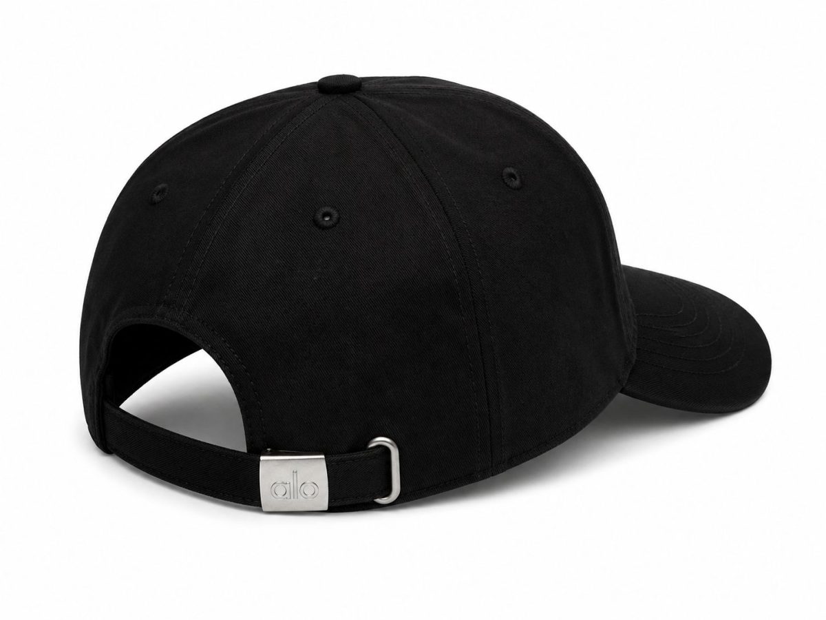 Back view of a black baseball cap showing an adjustable strap with a metal buckle.