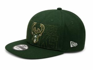 Green Milwaukee Bucks snapback cap with embroidered deer head logo and 'BUCKS' lettering on the front panel.