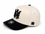Stylish monogram street cap with black and white design. Perfect for casual sportswear and urban fas.