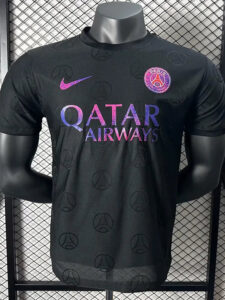 Black Paris Saint-Germain football jersey on a mannequin, featuring the pink Nike swoosh, PSG crest, and a purple-pink Qatar Airways sponsor across the chest.