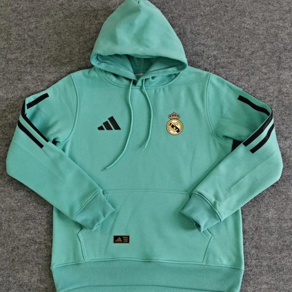 Mint green Real Madrid hoodie with hood, Adidas logo on left chest and the club crest on the right; black stripe accents on sleeves.