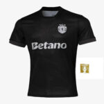 Black soccer jersey with a dotted pattern, SCP Portugal crest on the left chest, and 'Betano' sponsor across the front.