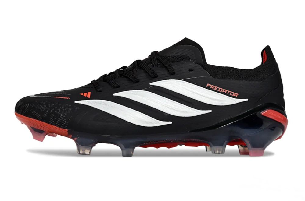 96cfcd1d-855a-4d7b-9f7a-050c26f90b5f | UAE SPORT STORE Black Adidas Predator soccer cleat with white stripes and red accents on a white background, studded sole visible.