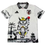White polo shirt featuring black ink-style Japanese landscape and Naruto-inspired figure, with Adidas logo and Japan Football Association crest.