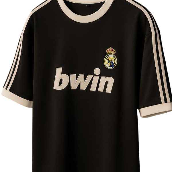 Black Real Madrid soccer jersey on a wooden hanger with white trim and the 'bwin' sponsor logo visible on the front.
