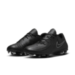Black Nike soccer cleats with studded sole and subtle textured upper on a white background