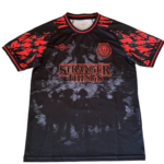 Black and red tie-dye Stranger Things jersey with a circular crest on the left chest and the 'STRANGER THINGS' logo across the front.