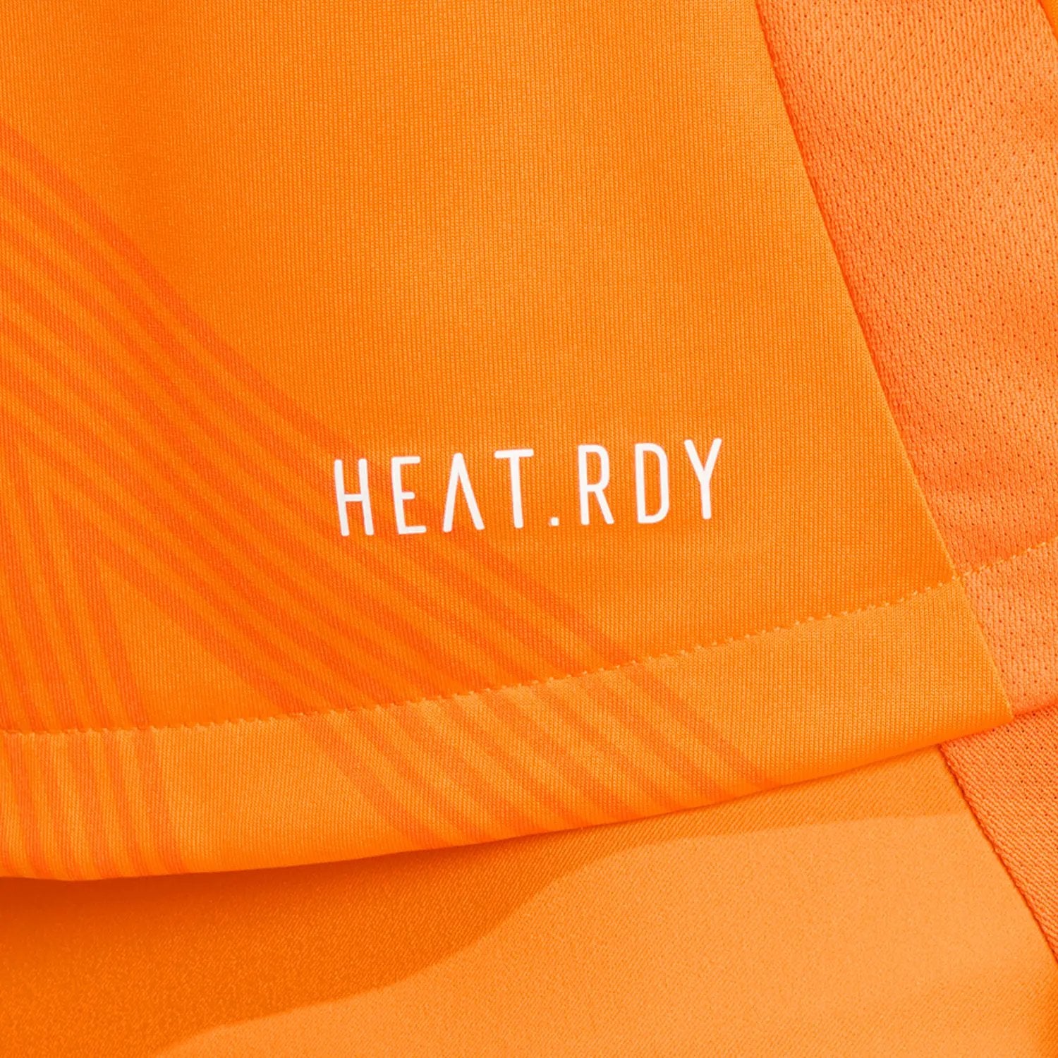 9cZvKlIBT5xHzc6 | UAE SPORT STORE Bright orange fabric with the white text 'HEAT.RDY' on it.