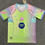 Pastel rainbow FC Barcelona youth soccer jersey laid flat, featuring Nike swoosh, club crest, Spotify sponsor logo, and a small 90 badge in the bottom-left.
