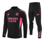 Black Arsenal training kit with pink accents: long-sleeve top with Emirates Fly Better slogan and crest, plus matching black pants with pink stripes. Option 2: Arsenal football club training gear: black jersey with pink trim and logo, and black pants with pink detailing. Option 3: Athletic training set in black with hot-pink panels, Arsenal crest, Emirates Fly Better text on top, and matching pants with pink stripes.